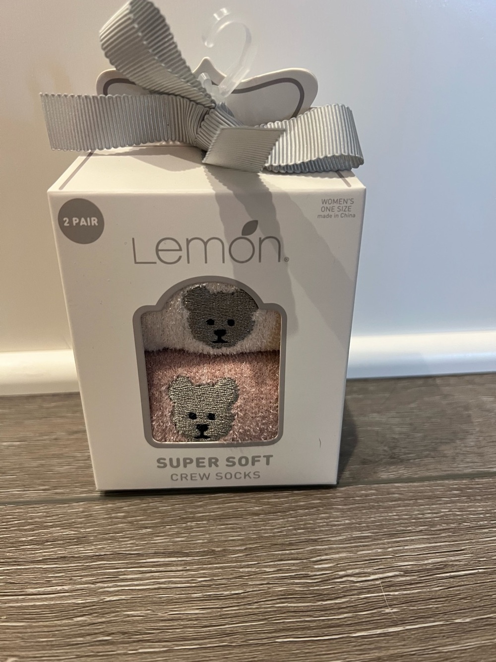 Women’s two-pack of Lemon soft crew socks w/ embroidered teddy bear faces.